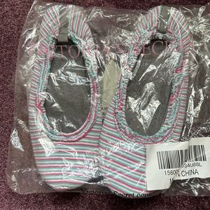 NWOT pair of slippers from Victoria’s Secret; women’s large